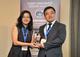 (Right) Mr. Benson Fei, Country Head, Huawei Enterprise, Singapore, receiving the awards from Ms. Rachel Leong, Head of IT, Tokio Marine.