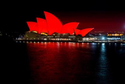 The Sydney Opera House lit in red (Photo credit: James Horan)