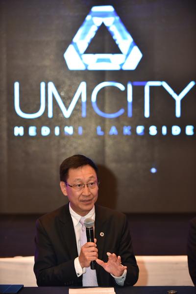 Datuk Chia Lui Meng, UMLand Group CEO interacting with the media