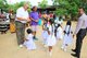 Mr Barry Rawlinson, Chief Executive Officer of Asia Plantation Capital, and Mr Satianathan, client of Asia Plantation Capital, blessing the children of Morapathawa Primary School.