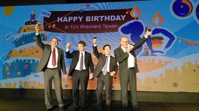 TUV Rheinland Group Chief Operating Officer Ralf Scheller (second from left) and top management raise a toast to the 30th anniversary of the Taiwan branch