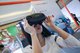 Consumers try out COOCAA’s VR equipment