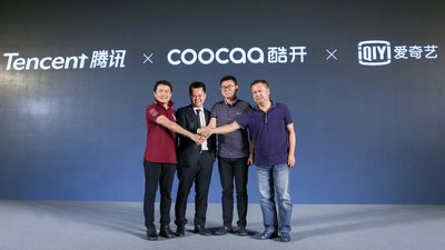 Group photo for Zhao Gang, general manager of the Living Room Product Department at Tencent (first from left), Lin Jing, CEO of COOCAA (second from left), Wang Zhiguo, chairman of COOCAA (second from right) and Duan Youqiao, senior vice president at iQIYI (first from right), at the press conference