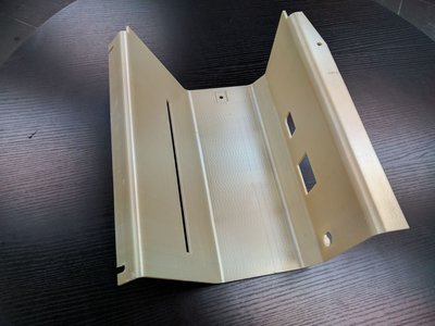 Final business class headphone cabinet part, 3D printed in ULTEM 9085 material with the Stratasys Fortus 900mc Aircraft Interiors Certification Solution