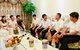 国家质检总局副局长吴清海（右3）走访了普通居民家，了解居民对进口食品的需求和建议，以美素佳儿进口奶粉为例，介绍进口监管和流程等。