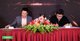 施耐德电气合作业务中国事业部市场部副总裁朱文沁与合作伙伴签约