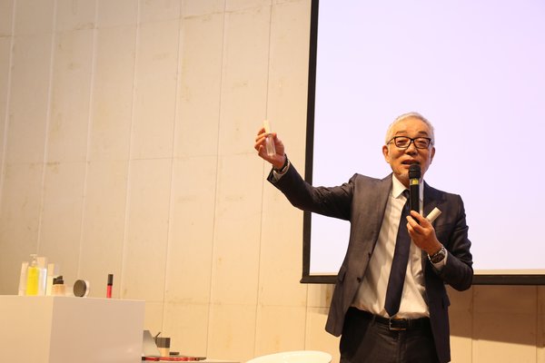 THREE Founder Yasushi Ishibashi introduces new products at the launch event in the NetEase Building, Hangzhou.