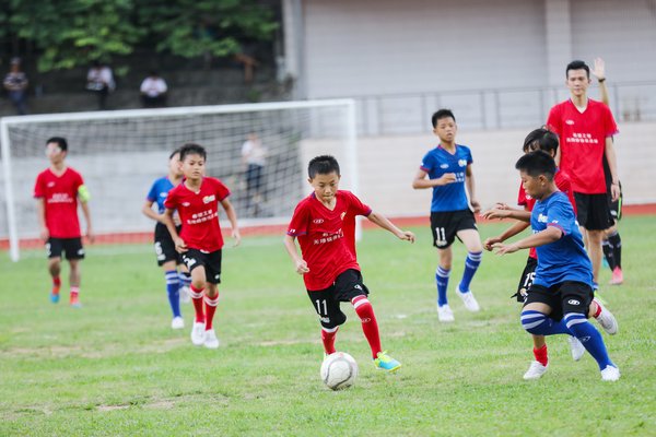 Children playing a fierce match at the training camp