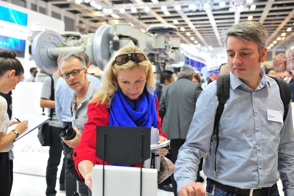Two visitors show high interest for CRRC’s latest and most advanced product offerings exhibited on the stand at InnoTrans 2018