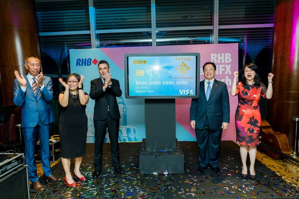 RHB TravelFX was launched on 18 September 2018 by (L to R) Ng Fook Sun, Executive Vice President, Financial Institutions, Wirecard, Clara Lee, Head, Technology & Operations, RHB Singapore, Chris Skok, Head of Product, Singapore and Brunei, VISA, Mike Chan, Country Head & CEO, RHB Singapore, and Wong Chung Yee, Head, Personal Financial Services & Wealth Management, RHB Singapore
