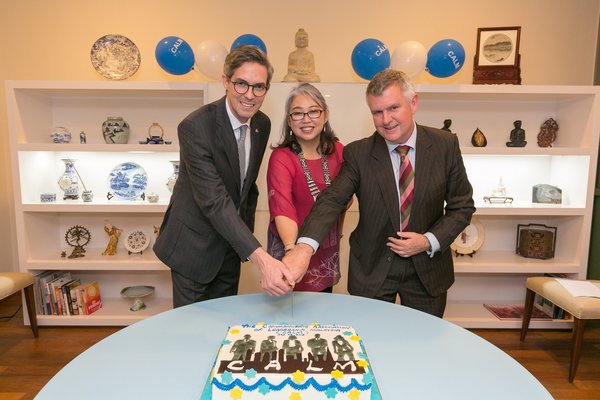 Cutting the cake (Tim Mackey, Canadian High Commission; Hanaa Wong, CALM President; Dr Chris Hartley, ELD)