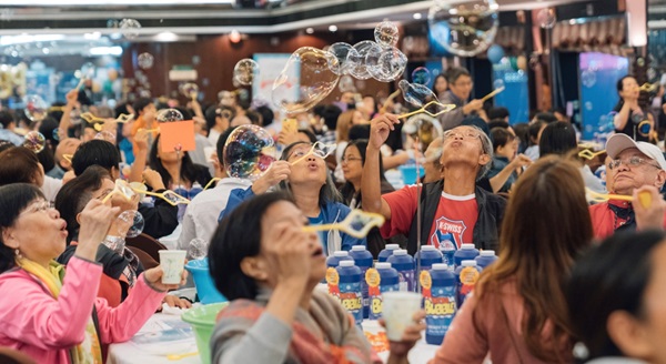 More than 250 participants attempting to set a Guinness World Records title for the Largest Soap Bubble Making Lesson