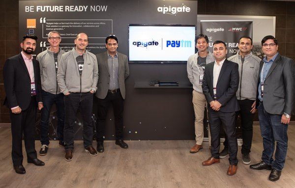 Apigate and Paytm management team sign agreement at Mobile World Congress for eWallet and content services