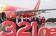 Vietnamese National Assembly Chairwoman Nguyen Thi Kim Ngan with fellow dignitaries from the National Assembly as well as executive representatives of Vietjet and Airbus join the cutting of the red ribbon at the delivery ceremony of the new A321neo