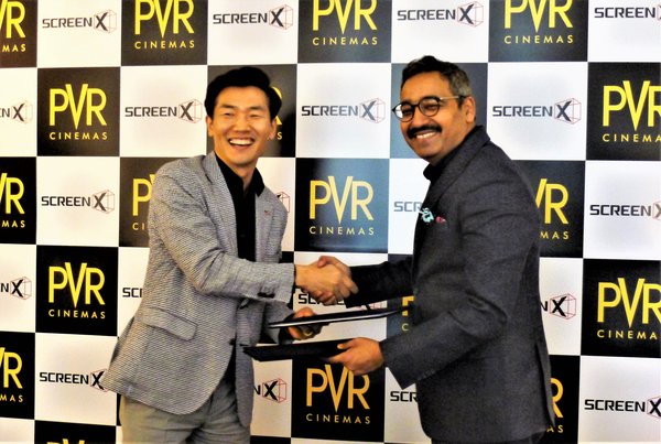 JongRyul Kim, CEO of CJ 4DPLEX (left) and Mr. Gautam Dutta, CEO of PVR Cinemas (right)
