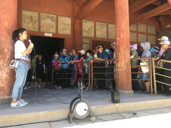 Interns who passed the assessment officially started internship on 5 July to explain mystery of the Caves. Ms Agnes Sung Pui Yee (1st from left), an intern, believed that the most difficulty in serving as guides of Dunhuang Mogao Craves was not to recite all kinds of historical materials, but to touch audience through elaboration.