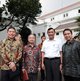 (L-R) Anthony Tan, CEO of Grab; Masayoshi Son, Chairman & CEO of SoftBank Group; Luhut Binsar Panjaitan, Indonesia Coordinating Minister for Maritime Affairs; and Ridzki Kramadibrata, President of Grab Indonesia outside the Merdeka Palace in Jakarta after a meeting with Indonesia President Joko Widodo.