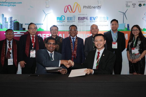 SEAL THE PARTNERSHIP DEAL. (from left, seated) Mr. M. Gandhi (Group Man. Dir. (ASEAN Bus. & Sr. VP- Informa Markets Asia) and Dr. Cirilo Calibjo (Nat Pres - IIEE). (from left, at the back Ir. Mohd Khir bin Muhammad (Hon. Sec - IEM); Ir. David Lai Kong Phooi (Pres. - IEM); Dr. S. Milton (Sr Advisor of METI); Dato’ Ir. Ahmad Asri Hamid (Chief Exec - CIDB, Malaysia); Mr. Erel Narida (Pres - REAP); Mr. Edmund Araga (Pres - eVAP); Ms. Maria Concepcion Simundac (CorpSec - PE2).