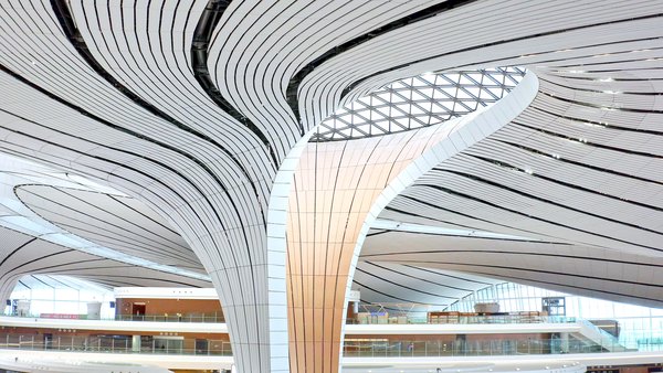 The well-lit atrium of the Beijing Daxing Internatinal Airport