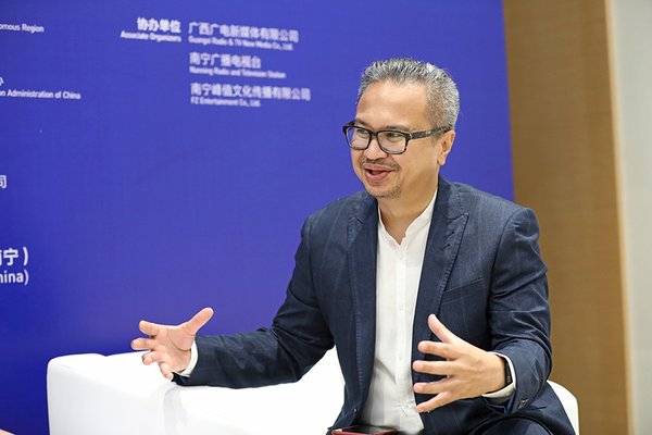 Joshua Simandjuntak, Deputy Chairman for Marketing of BEKRAF, is interviewed by CRIOnline’s Guangxi Channel. Photograph by Zheng Xiaojun.