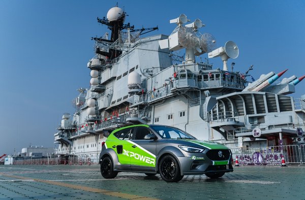 MG ZS car model displayed on aircraft carrier deck