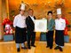 2019年9月，李锦记酱料集团主席李惠中先生（左二）看望在成都香格里拉酒店工作的希望厨师