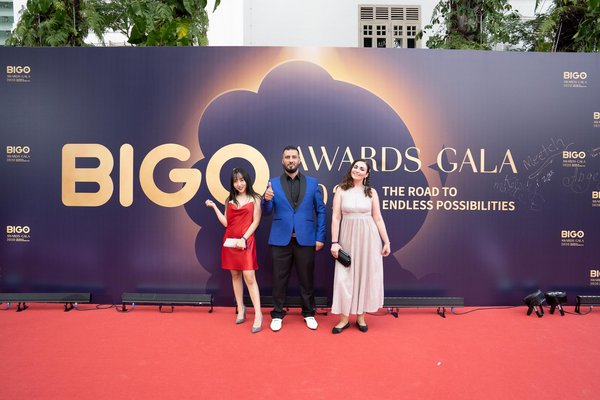 Australian winners of Top Regional Family (middle) and Top Regional Broadcasters (left and right) are seen here on the red carpet leading to the Awards Ceremony.