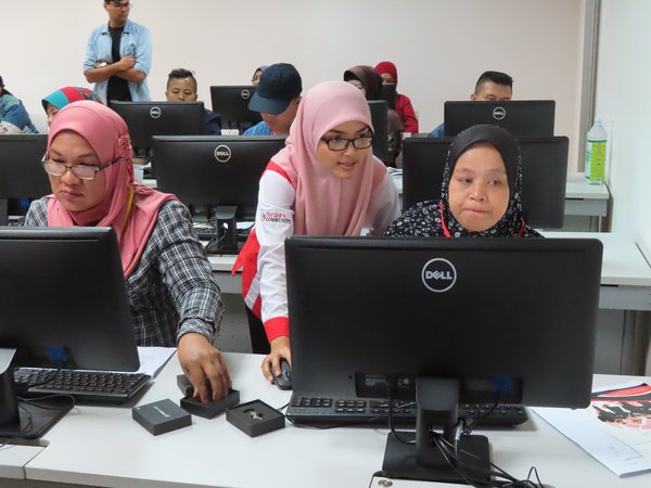In one of last year's classes by PK Taylor's-CIMB Islamic, participants were taught to make presentation slides using computers. To adapt to today's climate, they have moved to learning online.