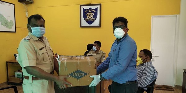 Hengtong India distributed face masks and hand sanitiser kits to the police officers