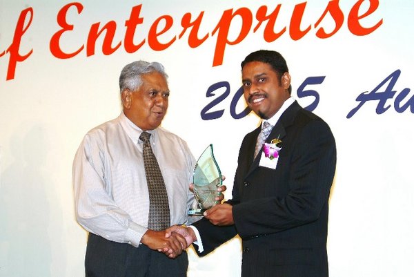 fyr, receiving the honorary ‘Spirit of Enterprise’ award from the late President of Singapore Mr. S.R.Nathan for his radio show syndication and contribution to the corporate events industry in 2005.