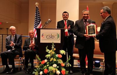 CSID presents 2014 "Muslim Democrat of the Year Award" to Tunisia's Nahdha Bloc at the National Constituent Assembly