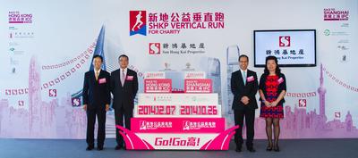 The ceremony was officiated by SHKP Deputy Managing Director Mike Wong (Left Two) and SHKP Executive Director and Chief Financial Officer and 'SHKP' Vertical Run for Charity - Race to Hong Kong ICC’ Event Organizing Committee Co-chairman Patrick K W Chan (Right Two). The 'SHKP Vertical Run for Charity' will be held at a much larger scale with a series of special events launching, and pictured with representatives of beneficiary organizations.