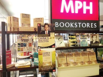 The English version of Li Hejun's first book, China's New Energy Revolution, is now available in Singapore bookstores, including this MPH store in the Raffles City Shopping Centre. The book describes how new energy, led by thin-film solar, will revolutionize the way China and the rest of the world generate power. (Photo by Xie Hanshuang, Hanergy)