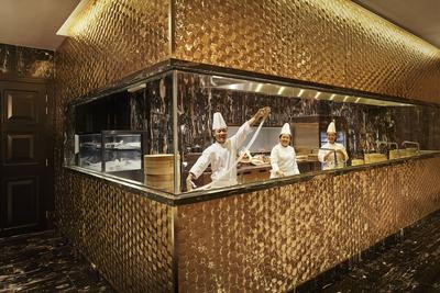   Patrons can appreciate the art of hand-making noodles through the transparent cooking station at Feng Wei Ju