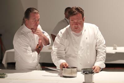 Neil Perry AM and Peter Gilmore plating up their main dishes showcasing premium Australian produce