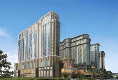 An artist’s rendering depicts The St. Regis Macao, Cotai Central (left), part of the Sands Cotai Central integrated resort. Sands China Ltd. recently topped out the 38-storey hotel.