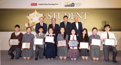At the Student of the Year awards presentation ceremony, the nine winners receive their accolades from (back row from left) Mr. Winfried Engelbrecht-Bresges, CEO of The Hong Kong Jockey Club; Mr. Eddie Ng, Secretary for Education, HKSAR Government; Mr. Robin Hu, CEO of the SCMP Group and Mr. Allan Zeman, Chairman of Lan Kwai Fong Group & Honorary Advisor of Ocean Park.