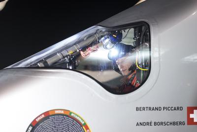 Pilot Bertrand Piccard undertaking last check before taking off for the leg to Mandalay