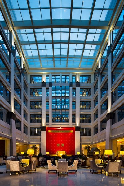 Hotel lounge adorned with a pair of iconic ancient-looking red doors