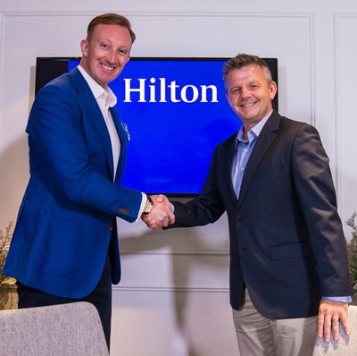 Mark Liversidge (Vice President Marketing - Asia Pacific, Hilton Worldwide) and Mike Kerr (CEO, Asian Tour) at the contract signing to confirm Hilton Worldwide as the Official Hotel Partner of the Asian Tour.