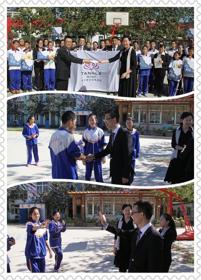 北京唐拉雅秀酒店副总经理许光友与蒲公英学校孩子们