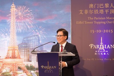 Sands China Ltd. President and COO Designate Wilfred Wong delivers remarks at the topping out ceremony for The Parisian Macao's Eiffel Tower Thursday. Sands China's newest integrated resort and its half-scale replica Eiffel Tower are slated to open in the second half of 2016.