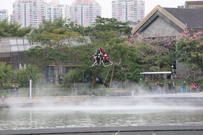 A KuangChi Martin Jetpack flies over a lake during a demonstration in Shenzhen, China on December 6, 2015.