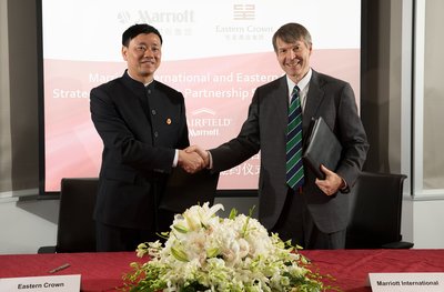 Mr. Cheng Xinhua (left), Founder, President and Chief Executive Officer of Eastern Crown Hotels Group and Paul Foskey, Executive Vice President, Hotel Development, Marriott International Asia Pacific (right).