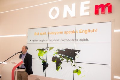 Itay Sagie speaking at ONEm stand at Mobile World Congress 2016