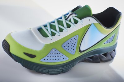 This true product-matching sports shoe prototype was produced with full color, smooth surfaces, and a rubber-like sole - all in a single print operation on the Stratasys J750 3D Printer.