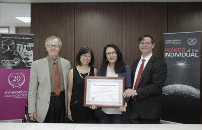At the signing ceremony of the Westgard Sigma Certification. From left to right: Dr. James O. Westgard, Dr. Carol Kwan, Ms. Ginny Foo and Mr. Sten Westgard