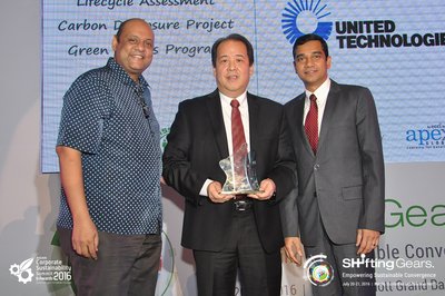 Mr. Raul Joseph Concepcion, President (middle) and Mr. Rajan Komarasu, Director, Concepcion-Carrier Air-conditioning Company (right) receiving the award on behalf of UTC from Mr. Sreenivas Narayanan, Managing Director, Asia Society for Social Improvement & Sustainable Transformation (ASSIST)