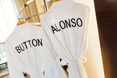 Hilton has provided a home to the McLaren-Honda Formula 1 team since 2005, so even amenities in the McLaren-Honda Suite like bathrobes are specially embroidered with the names of the McLaren-Honda Formula 1 team's drivers Fernando Alonso and Jenson Button.