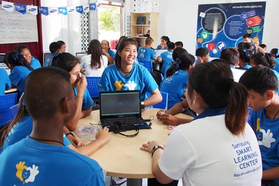 Students learning essential skills required in the digital age at one of the Smart Learning Centres in Thailand